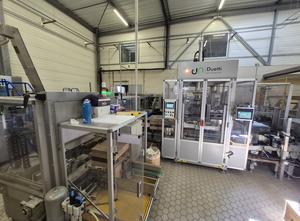 End of the packaging line – Carton former, bottle case packer, and sealer
